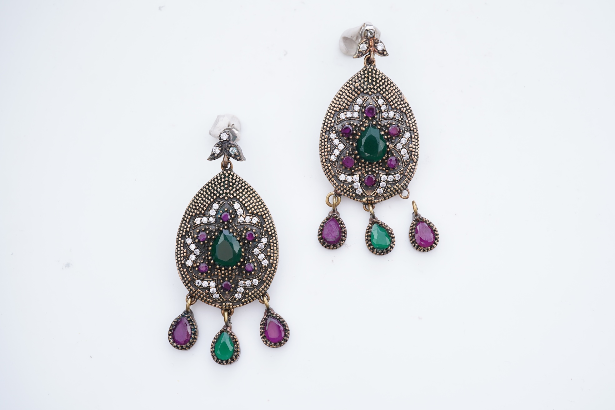 A pair of gem-set and diamond earrings